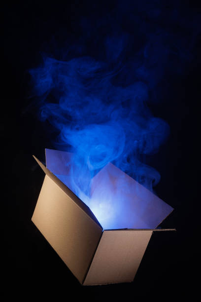 istock mysterious box opening with rays of light, mysterious gift concept 1459191036