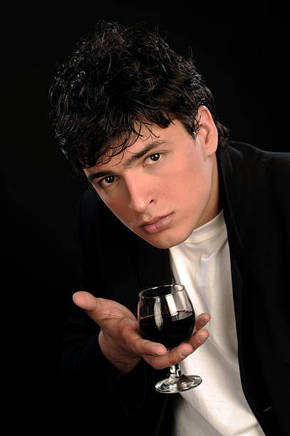 istock man with glas of wine 145919148