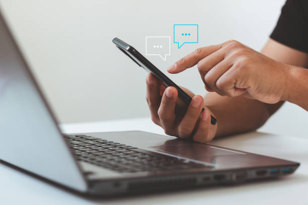 istock Social media network technology concept. Businessman using smartphone typing to send message to colleague , Communication by chat. 1459195109