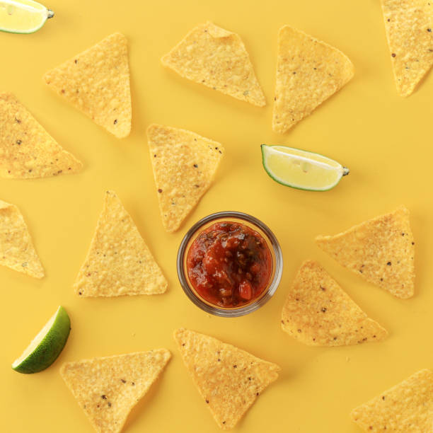 istock Nachos Mexican Chips with Tomato Salsa Sauce 1459195997