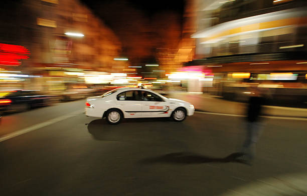 taxi at night stock photo