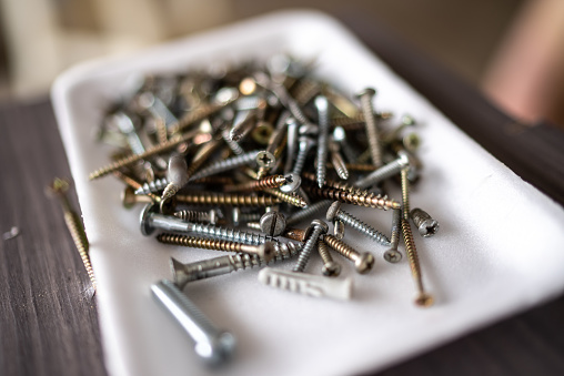 Close-up of amount of different screws