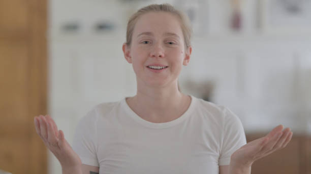 istock Blogging Beautiful Young Woman Talking Doing Video Call 1459200836
