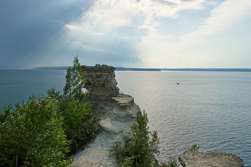 Pictured Rocks national Lakeshore provides stunning views of Lake Superior along this rocky coastline of the upper peninsula of Michigan. Rocky cliffs above Lake Superior.