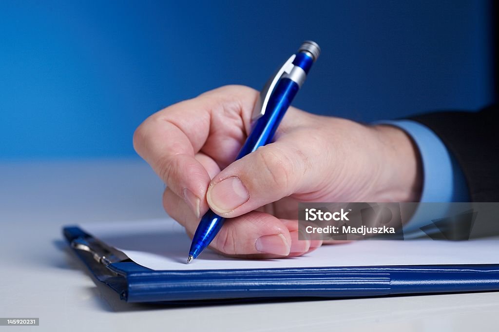 signature business - hand with pen Adult Stock Photo