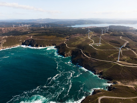Aerial panorama of renewable enegery windmill wind turbine farm park near Cabo Vilan Costa da Morte coast A Coruna Galicia Spain