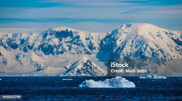 Icebergs In Blue Water Mountains Stock Photo - Download Image Now - Antarctica, Cold Temperature, Color Image