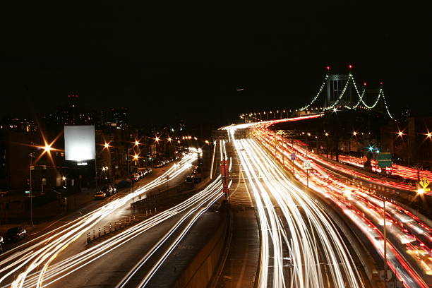 istock Light beams from cars at night 145920329