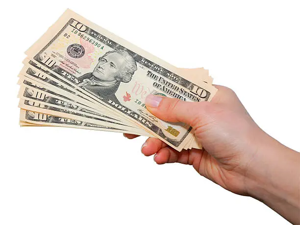 Photo of Hand with dollar notes isolated over white