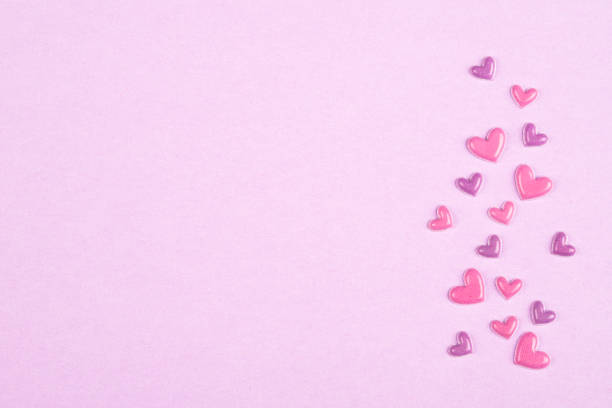 istock Hearts on pink background 1459204958