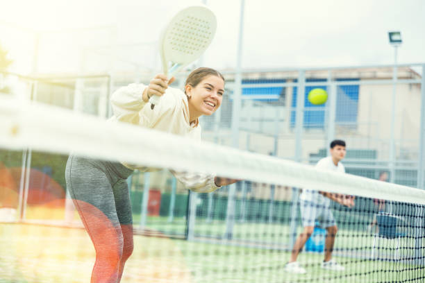 istock Young girl paddle tennis player performing forehand 1459206864