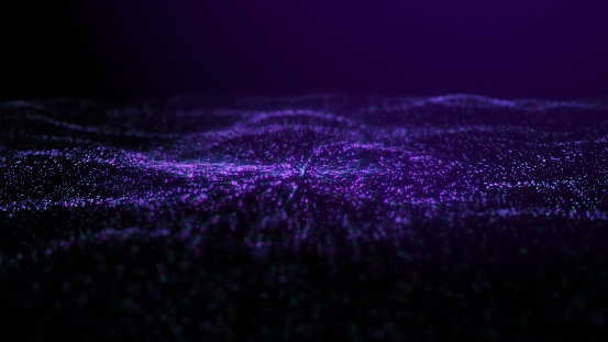 Glowing Purple particle form on dark background abstract concept stock photo