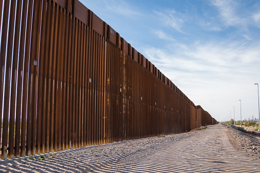 New border wall at US - Mexico border in Arizona  to keep undocumented or illegal immigrants out of the United States