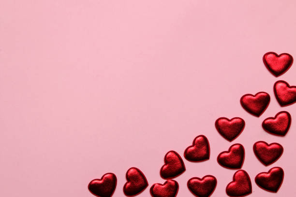 istock red hearts on a bright pink background. frame of hearts, top view with space for text 1459213854