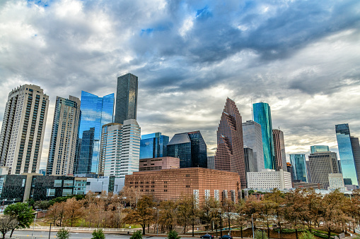 The modern and unique skyline of Houston, Texas on a cloudy winter afternoon.