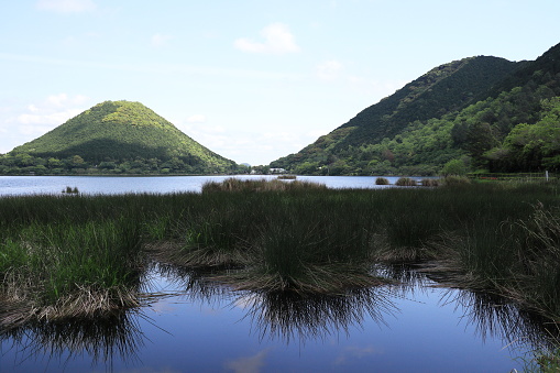 Imuta-ike lake reflecting like a mirror