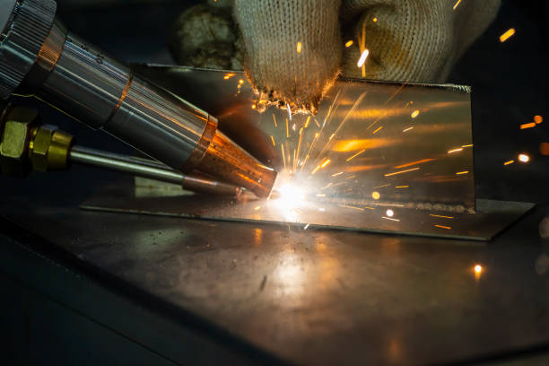 istock Close up scene the welding process with the sparking light. 1459231653