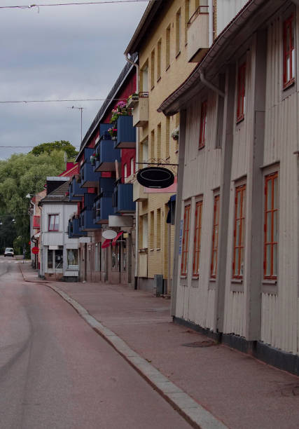 istock Empty road amidst buildings in city during summer 1459231875