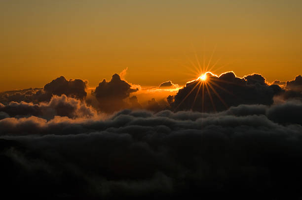 Sunrise above the Clouds stock photo