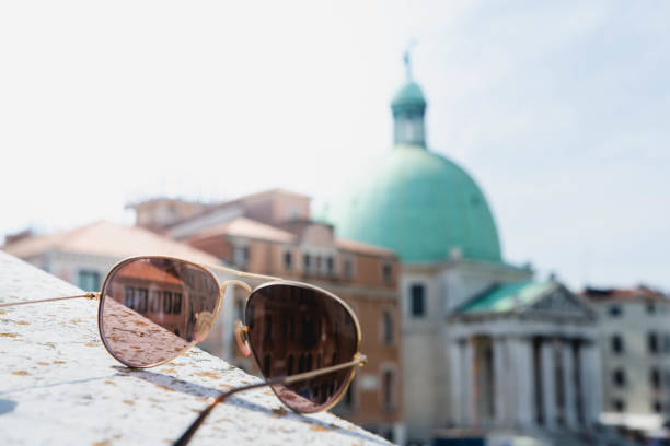 istock sunglasses on the Venice bridge in springtime 1459235735