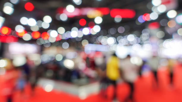 istock Abstract background blurred many people in the exhibition event. 1459235737