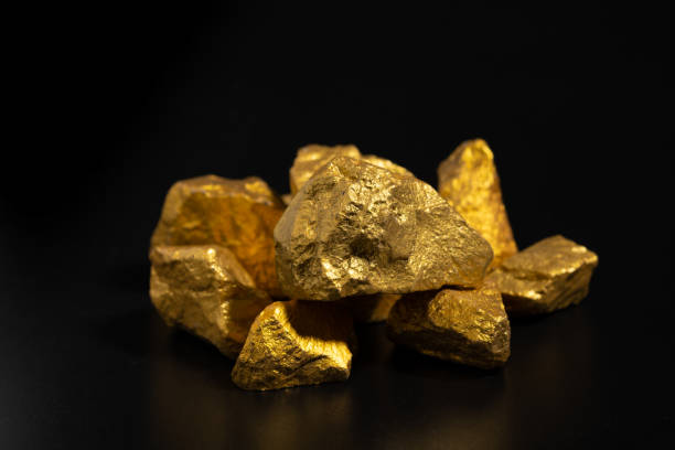 istock The pure gold ore found in the mine on black background 1459235750