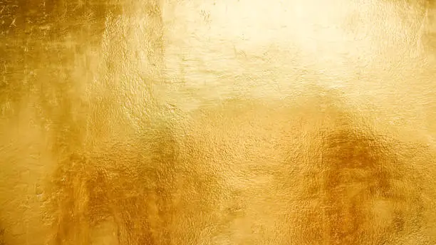 Photo of Gold shiny wall abstract background texture, Beatiful Luxury and Elegant