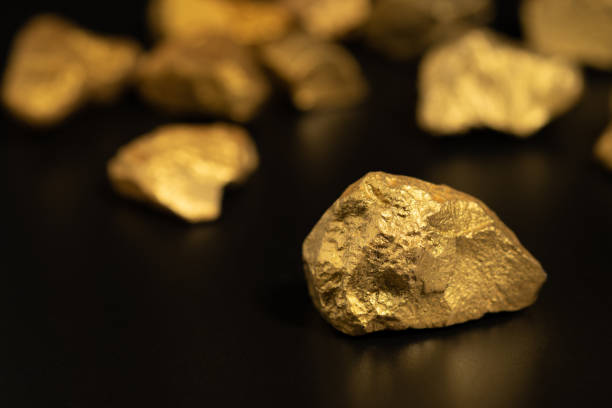 istock The pure gold ore found in the mine on black background 1459235775