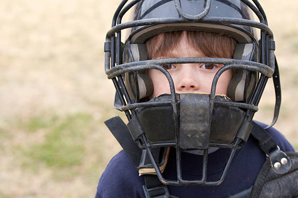 catcher a young boy in baseball catchers mask catchers mask stock pictures, royalty-free photos & images