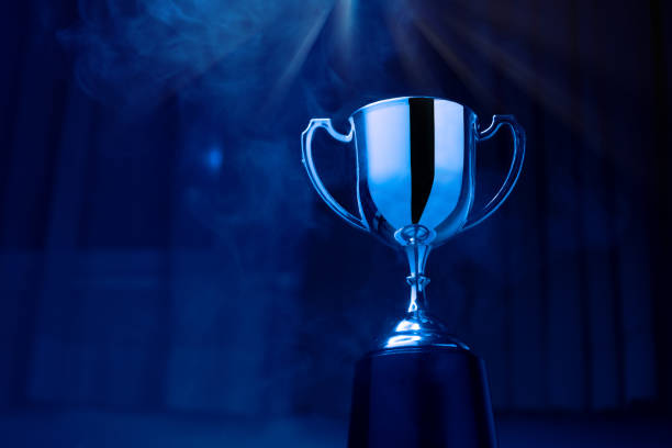 istock Silver Trophy competition in the dark with smoke and with copy space 1459238849
