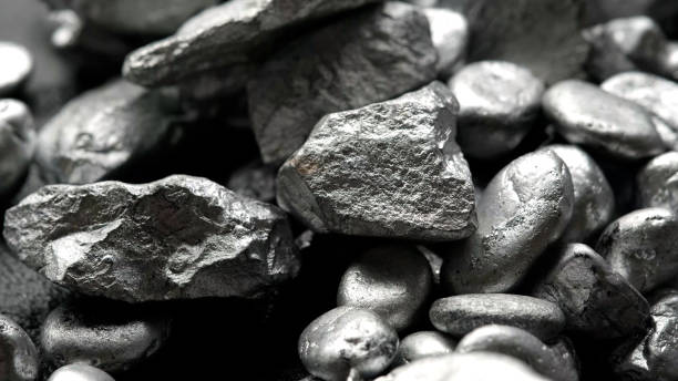 lump of silver or platinum or rare earth mineral on a floor - scandium imagens e fotografias de stock