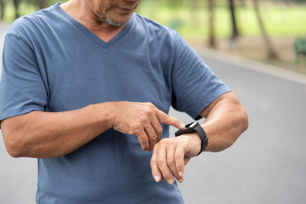 istock Mature Adult checking pulse 1459243425