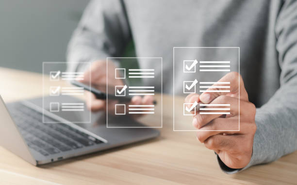 istock Questionnaire with checkboxes, filling survey form online, answer questions of test. Survey form concept. Education futuristic technology and learning concept. 1459247343
