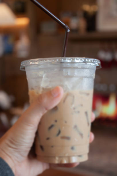 istock Woman hold her iced coffee 1459248031