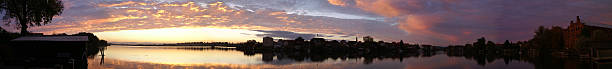 Panorama-Sunrise over a lake stock photo