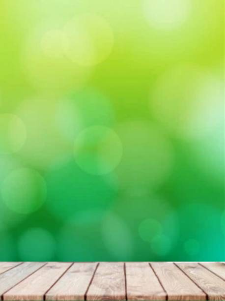 A green background with bokeh and table top