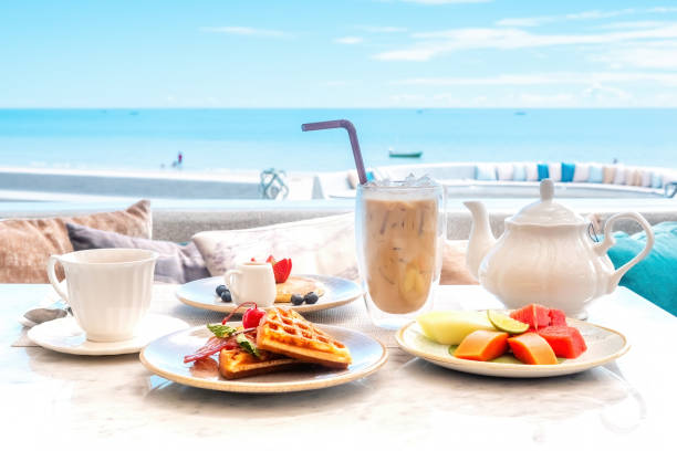 istock Beachfront hotel breakfast, beautiful morning on beach 1459253590