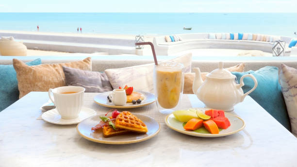 istock Beachfront hotel breakfast, beautiful morning on beach 1459254564