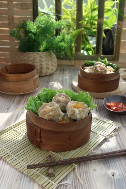 istock steamed dimsum on a bamboo tray 1459255508