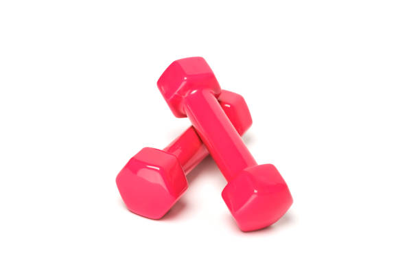 istock Pink or red dumbbells on a white background. 1459255553