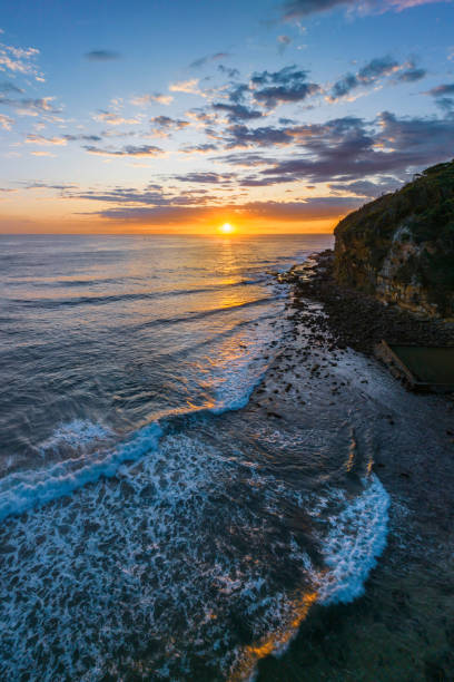 istock Sunrise at the seaside with clouds 1459258102