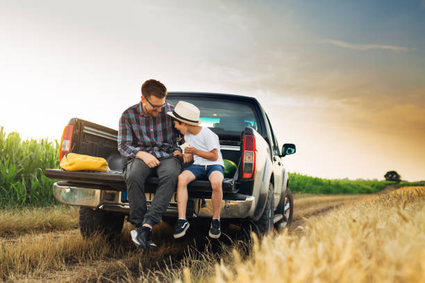 istock father and son outdoor on field 1459265573