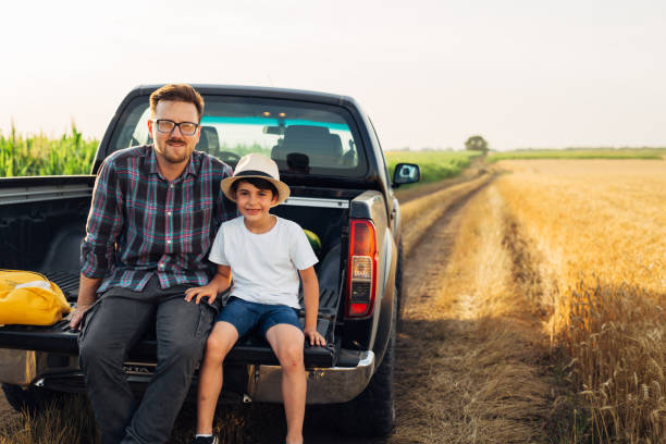 istock father and son outdoor on field 1459265575