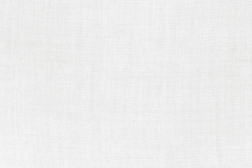 Textura de tela de lino blanco para fondo, patrón textil natural. photo