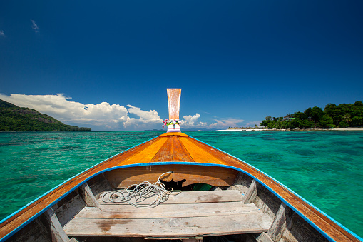 Beautiful blue sea from wooden longtail boat  at Koh Lipe, Satun Province, Southern Thailand.