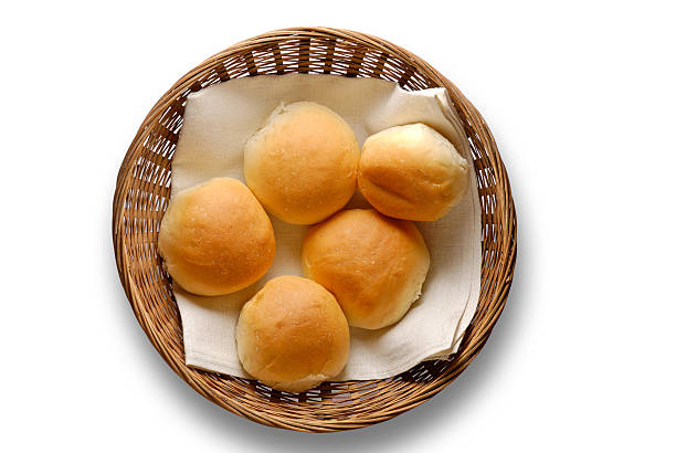 Bread rolls in basket with clipping path Bread rolls in basket with clipping path bun bread stock pictures, royalty-free photos & images