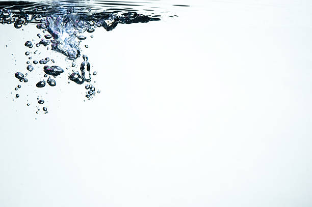 istock Bubbles with colorful highlights in water 145927452
