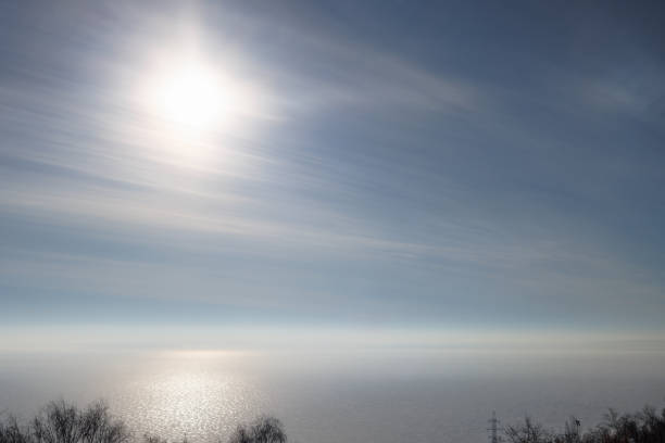 Bright sun in the blue sky.