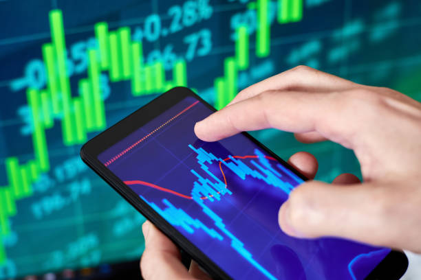 istock Trader analyzes stock market data in smartphone 1459275466