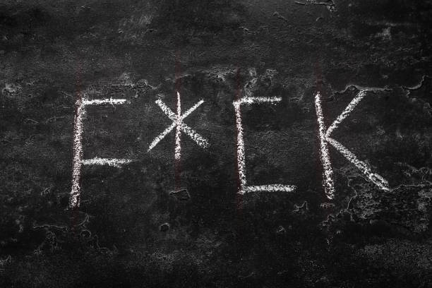 istock obscene word written in chalk obscene language 1459277613